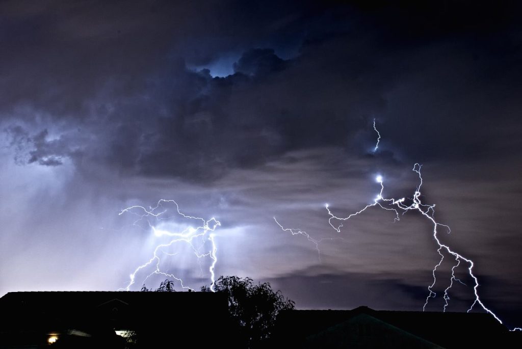Storm Warning Apps Add Lightning Alerts for Outdoor Workers lightning striking through dark storm clouds