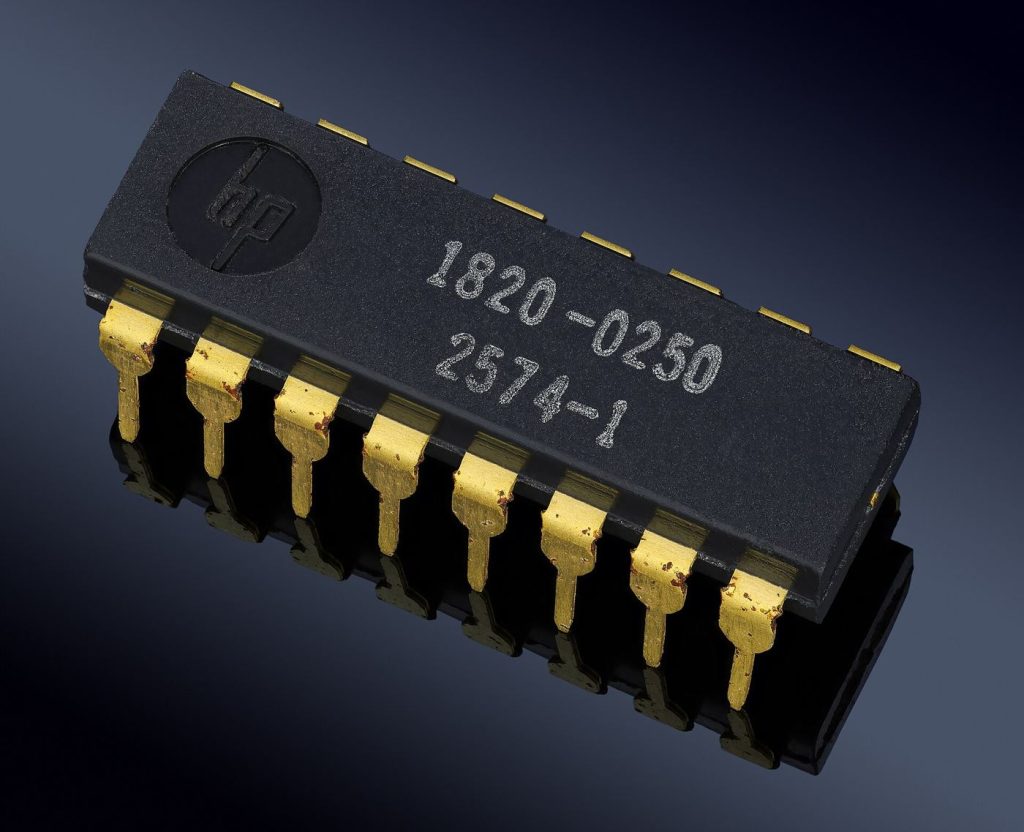 The Race for AI Chips Is Reshaping the Entire Technology Industry A close-up of an advanced computer chip on a green circuit board.