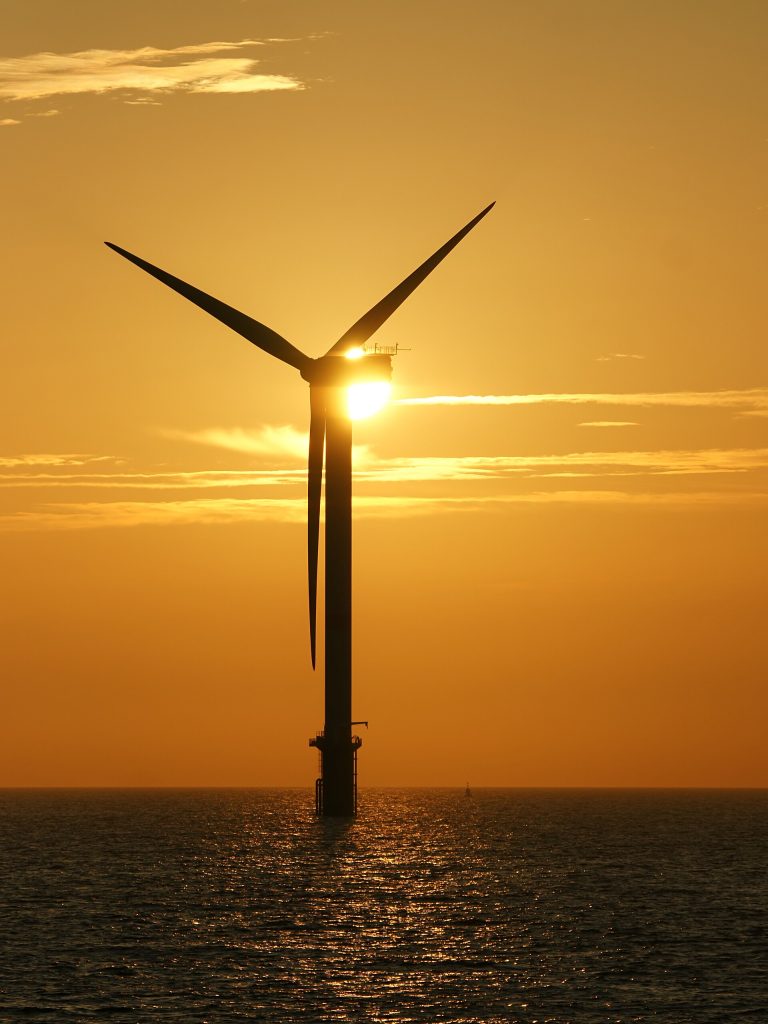 Smart Grids Learn to Juggle the Wind and Sun Offshore wind turbines generating renewable electricity