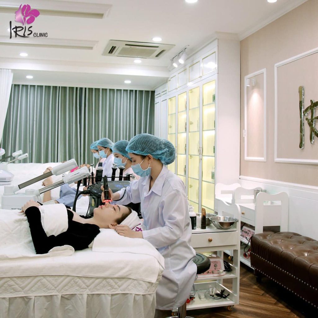 Cosmetic clinic esthetician giving a customized facial skincare treatment to a client